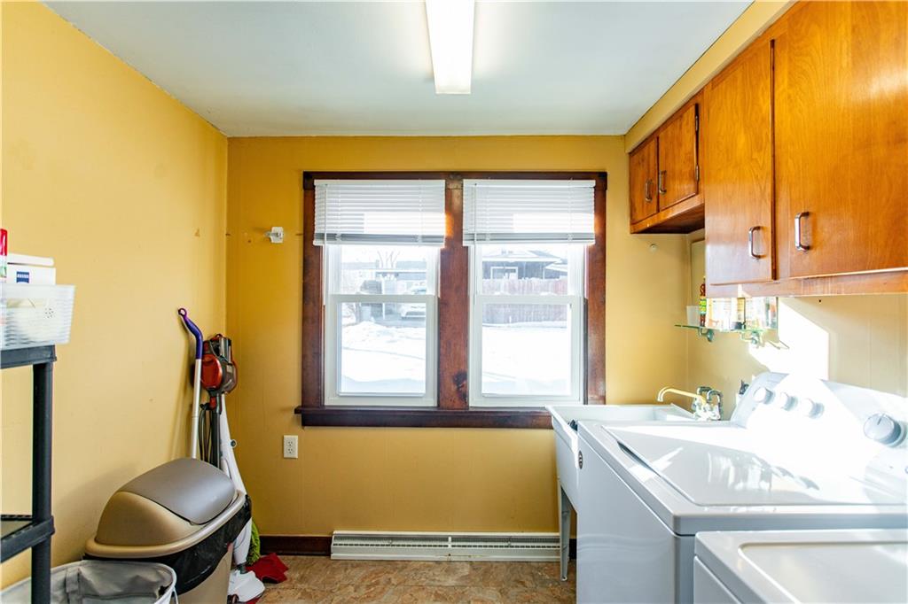 1146 Chestnut Street Monaca, PA 15061 - Photo 17 of 37 a bathroom with a tub sink and mirror