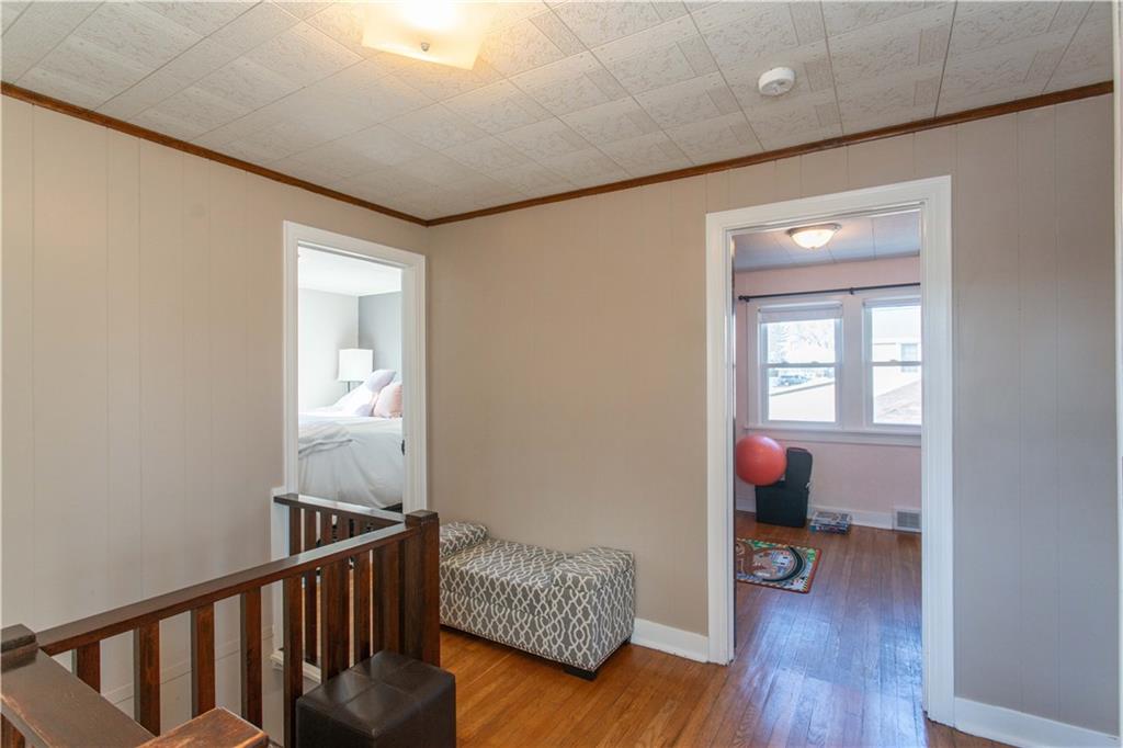 1146 Chestnut Street Monaca, PA 15061 - Photo 18 of 37 a view of a room with wooden floor and windows