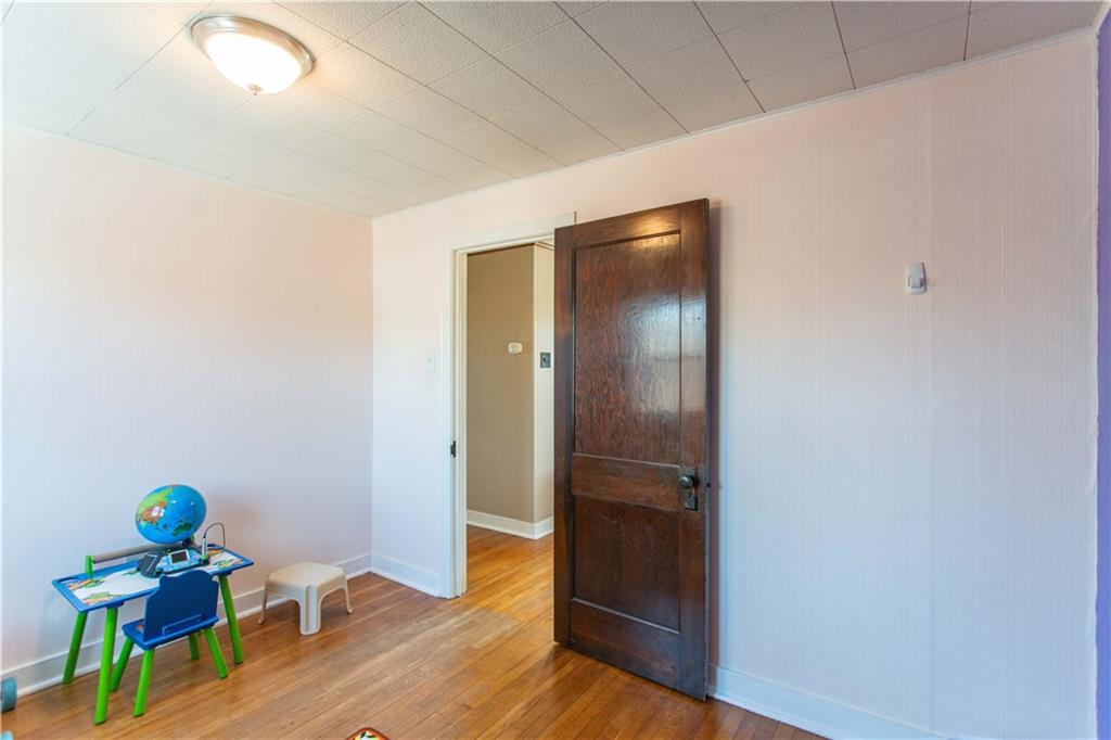 1146 Chestnut Street Monaca, PA 15061 - Photo 20 of 37 a view of room with wooden floor