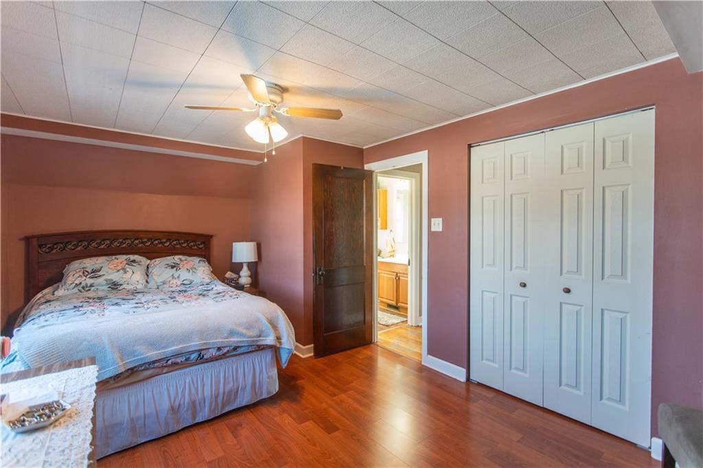 1146 Chestnut Street Monaca, PA 15061 - Photo 22 of 37 a bedroom with bed and a window
