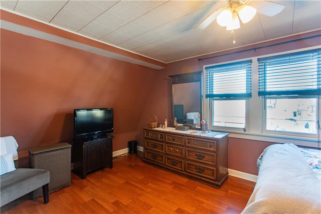 1146 Chestnut Street Monaca, PA 15061 - Photo 24 of 37 a living room with furniture and a flat screen tv