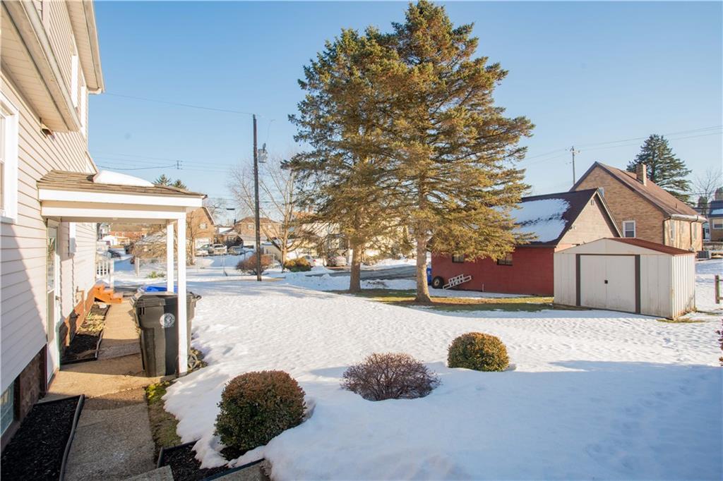 1146 Chestnut Street Monaca, PA 15061 - Photo 33 of 37 a view of a house with a yard