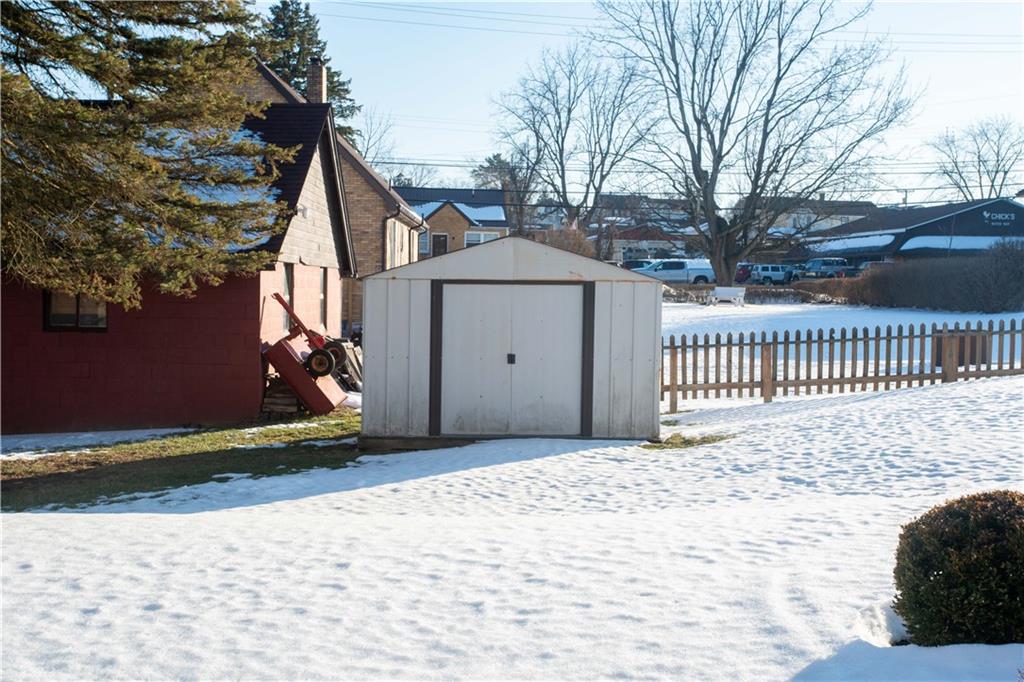 1146 Chestnut Street Monaca, PA 15061 - Photo 37 of 37 a view of a house with a small yard and a large tree