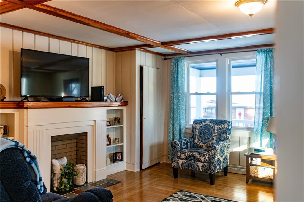 1146 Chestnut Street Monaca, PA 15061 - Photo 6 of 37 a living room with furniture and a fireplace