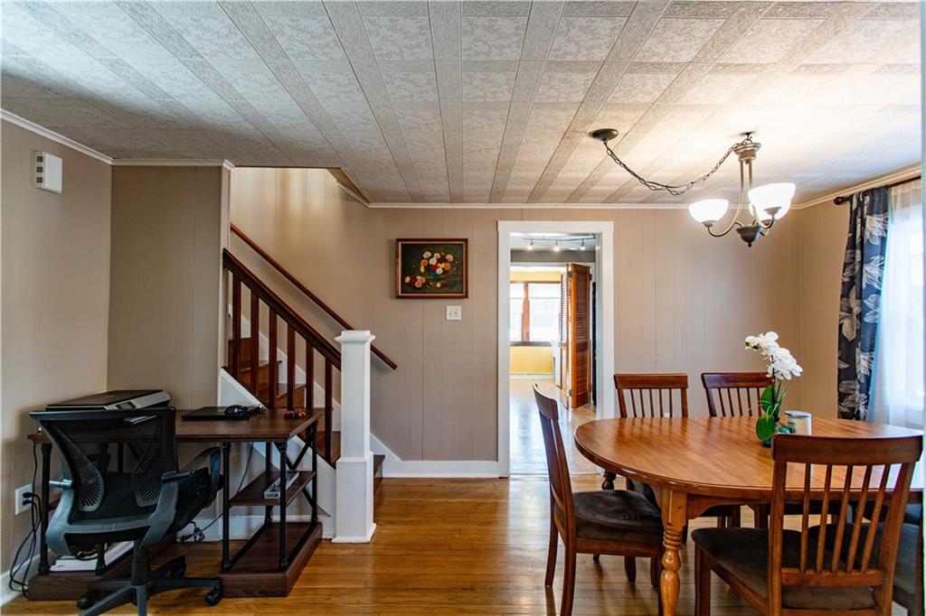 1146 Chestnut Street Monaca, PA 15061 - Photo 9 of 37 a view of a dining room with furniture and wooden floor