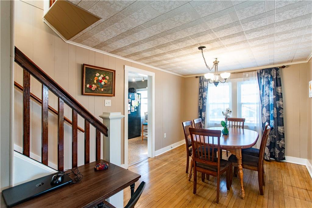 1146 Chestnut Street Monaca, PA 15061 - Photo 10 of 37 a view of a dining room with furniture window and wooden floor