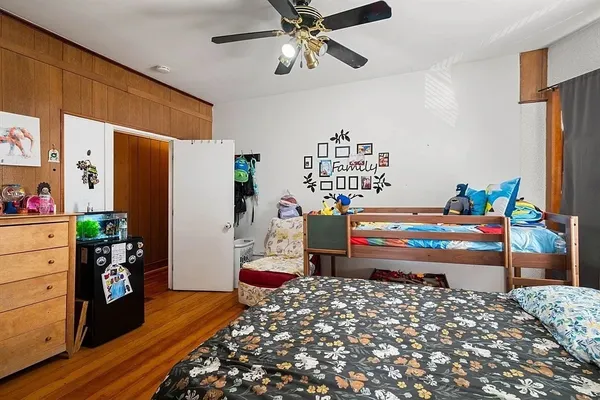 a room with furniture a rug and a window