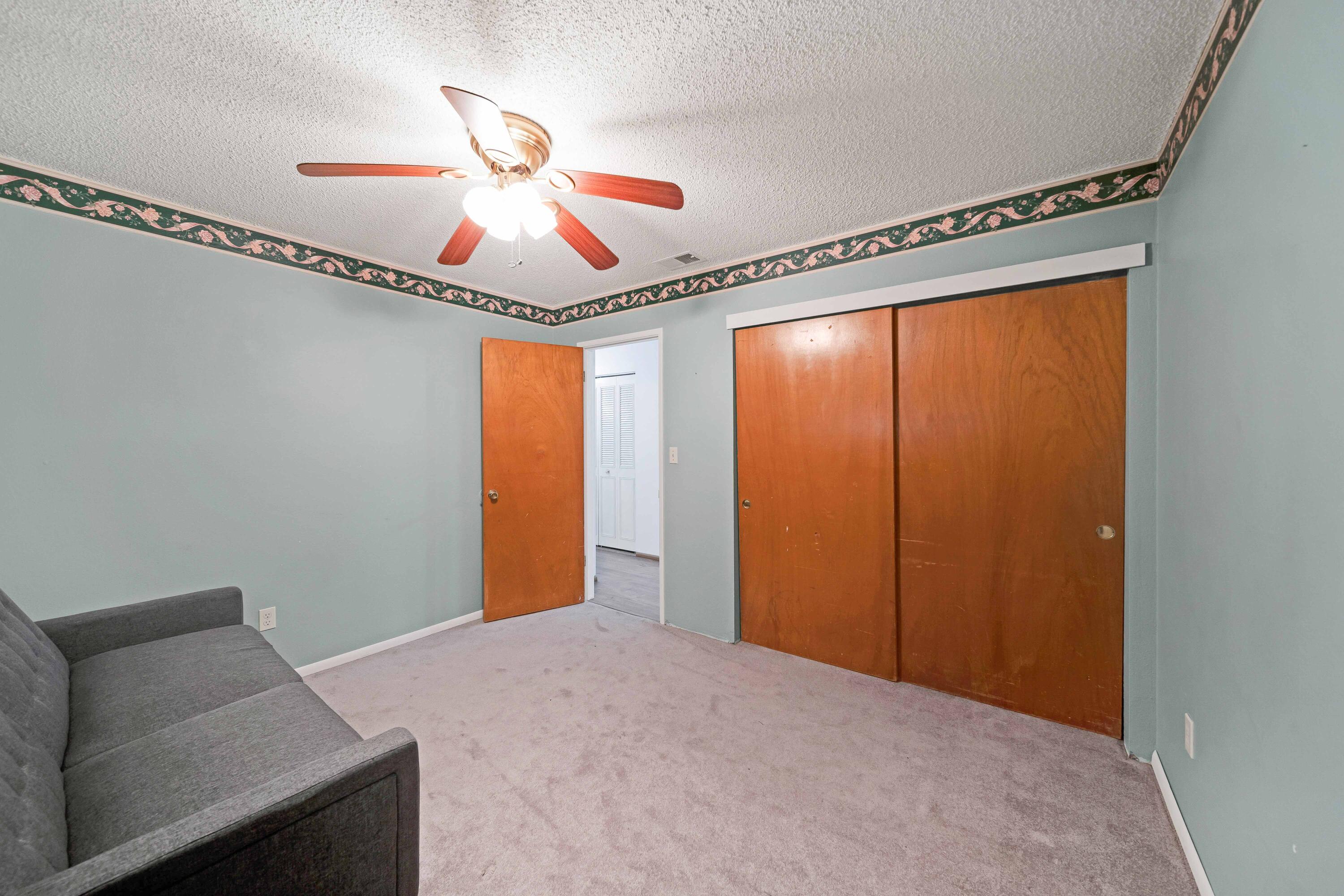 1945 Luning Street Red Bluff, CA 96080 - Photo 13 of 23 a bedroom with a bed and a window