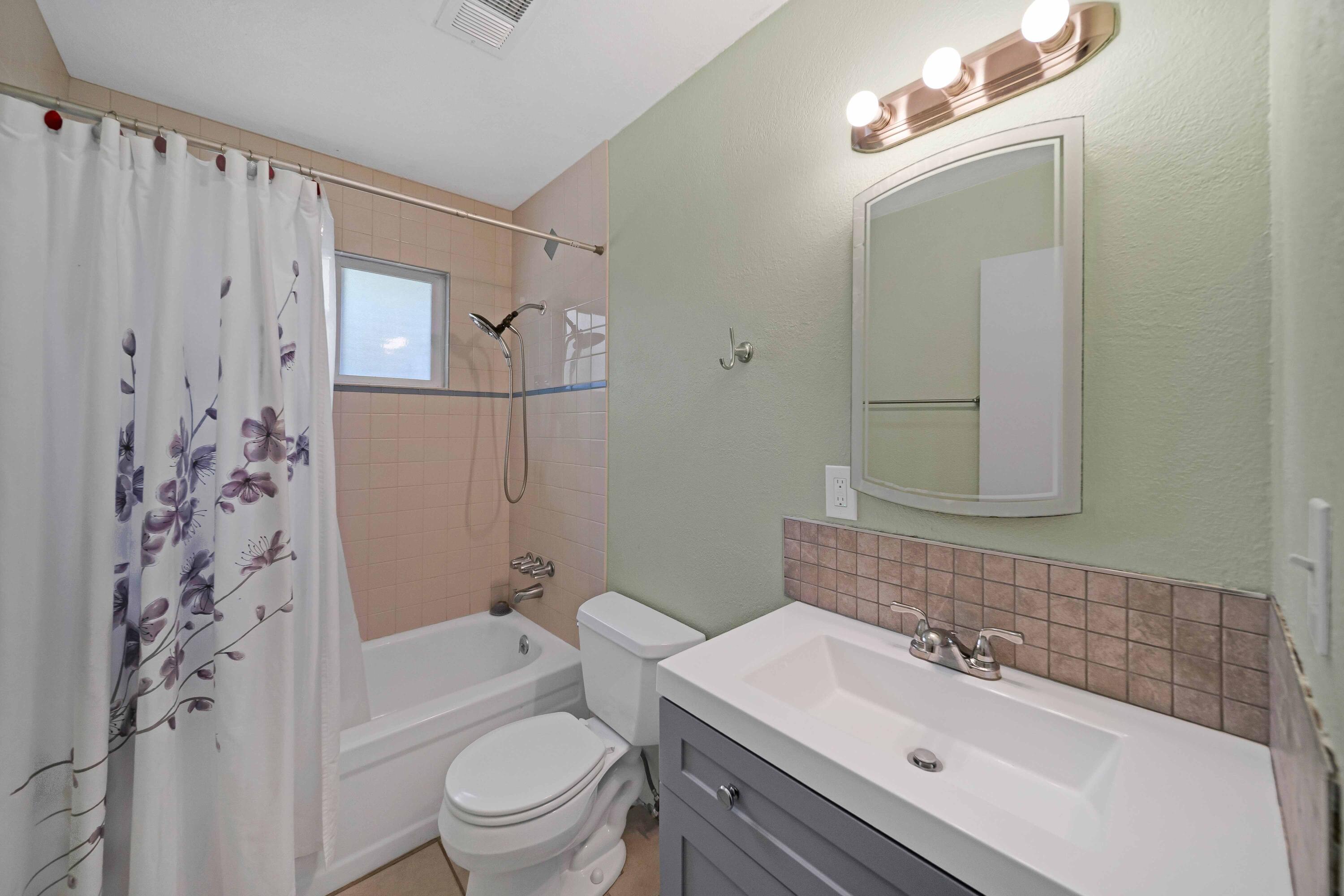 1945 Luning Street Red Bluff, CA 96080 - Photo 17 of 23 a bathroom with a sink toilet and shower