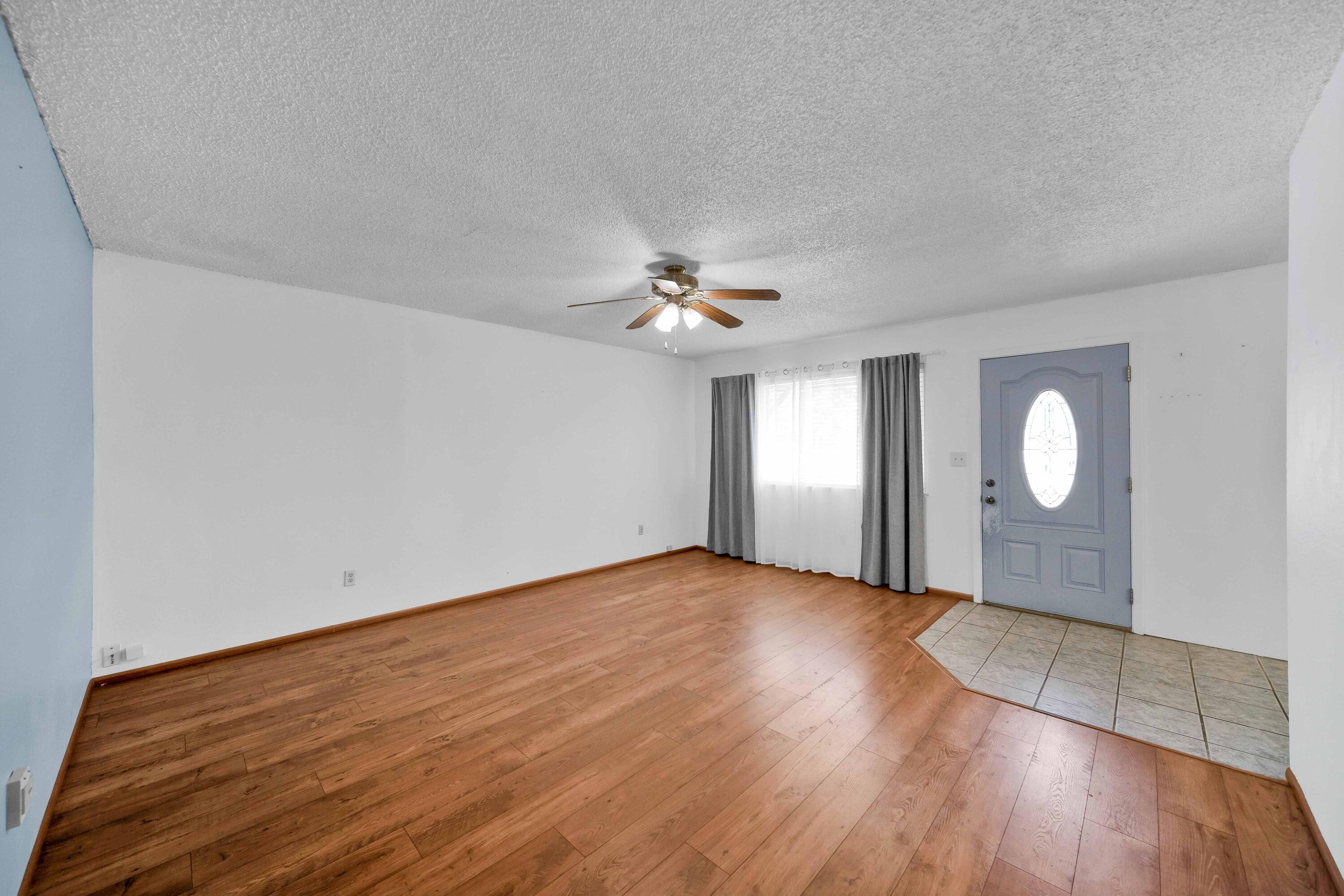 1945 Luning Street Red Bluff, CA 96080 - Photo 5 of 23 a view of a room with wooden floor and window