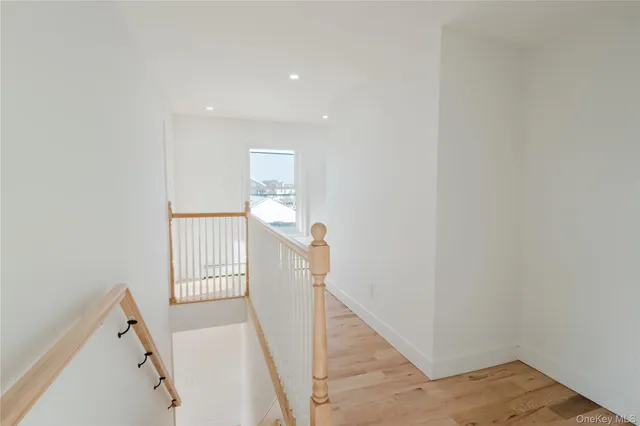 a view of a hallway with entryway