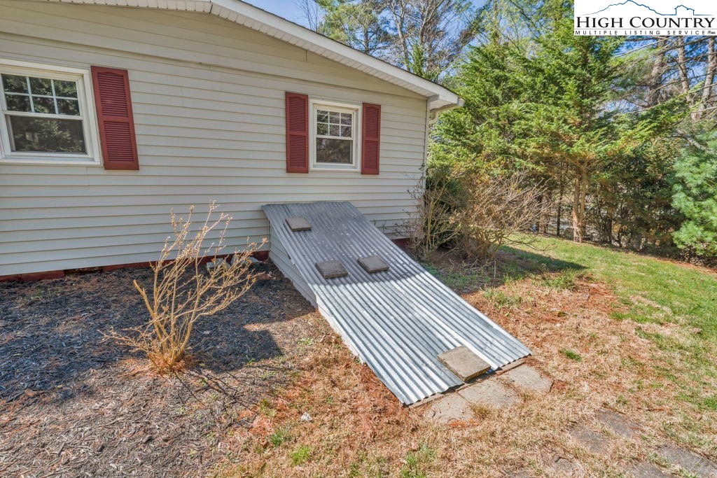 156 Olancha Avenue Boone, NC 28607 - Photo 16 of 23 a view of a backyard with sitting area