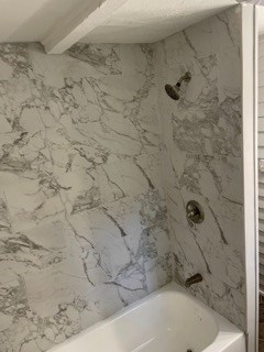 1429 25th Street Columbus, GA 31901 - Photo 11 of 17 a bathroom with a bathtub and shower