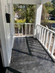 1429 25th Street Columbus, GA 31901 - Photo 13 of 17 a view of balcony with wooden floor