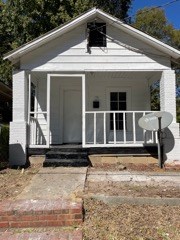 1429 25th Street Columbus, GA 31901 - Photo 2 of 17 a front view of a house with a yard