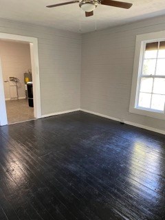 1429 25th Street Columbus, GA 31901 - Photo 6 of 17 wooden floor in an empty room with a window