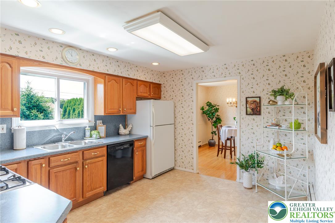 2130 Wisteria Road Lower Macungie Township, PA 18062 - Photo 17 of 48 A cheerful kitchen with abundant natural light from the window and plenty of space for a kitchen table & chair set.