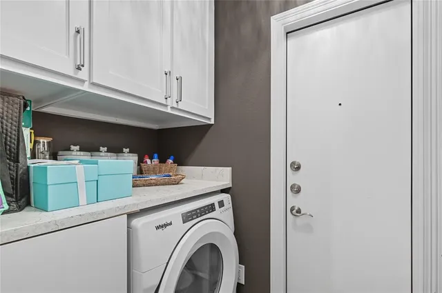 a view of a kitchen with washing machine