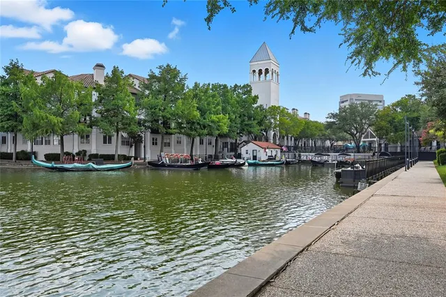 a view of a lake with a building in the background