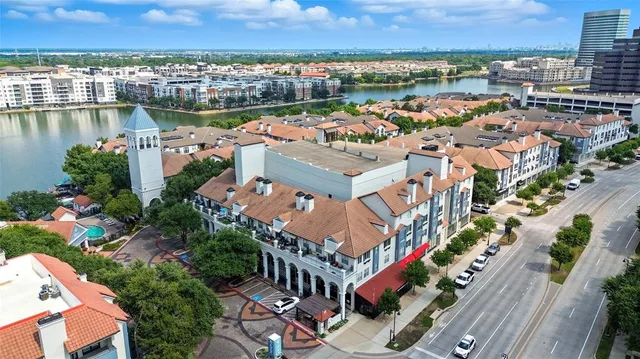 a view of a city and lake