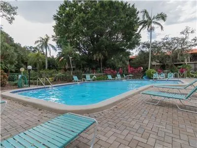 a view of a playground with basketball court