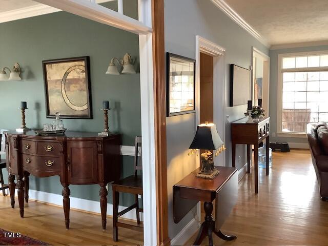 2125 Keith Hills Road Lillington, NC 27546 - Photo 25 of 66 a view of a dining room with furniture and wooden floor