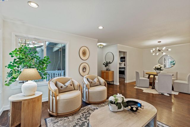 a view of dining room with wooden floor