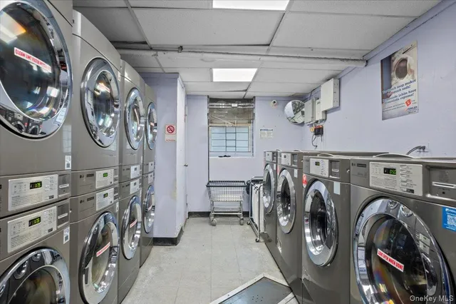 a view of storage and utility room with washer and dryer