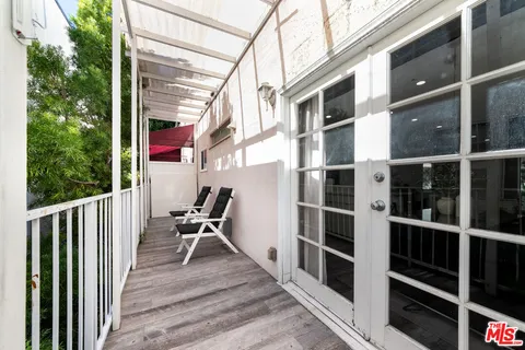 a building outdoor space with patio furniture