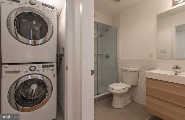 a bathroom with a toilet and a sink