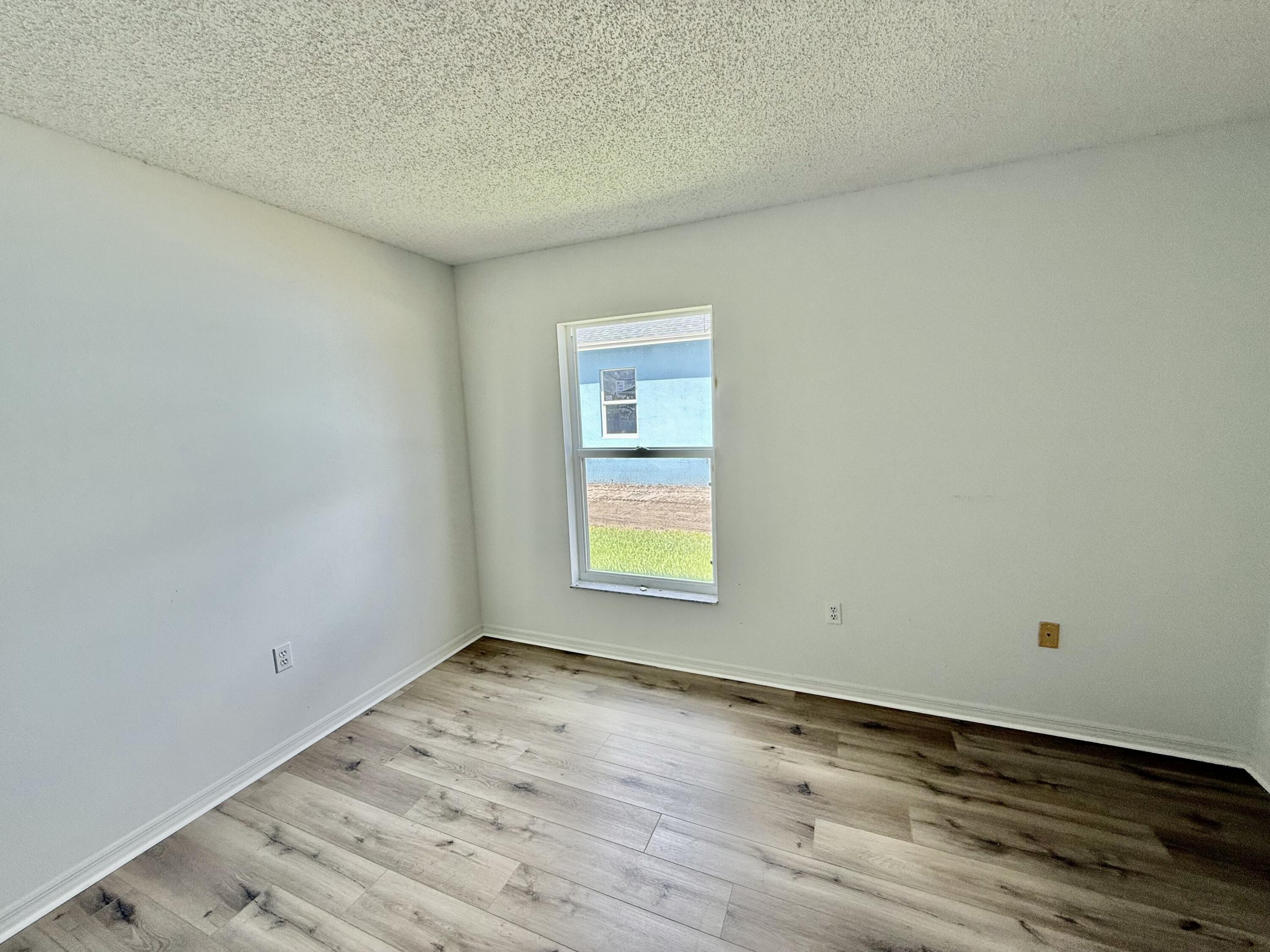 3259 Southeast W Snow Road Port St. Lucie, FL 34984 - Photo 19 of 24 Bedroom 3