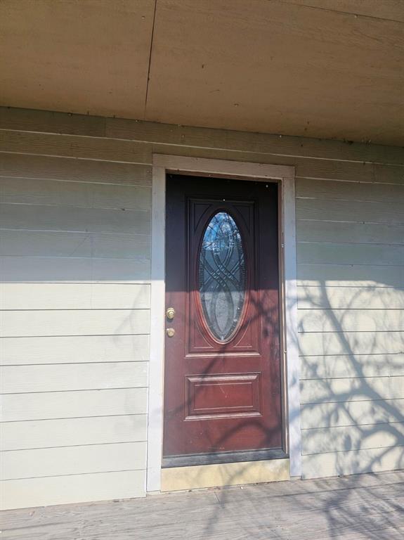 110 Choctaw Trail Whitney, TX 76692 - Photo 1 of 4 a front view of a house with entryway