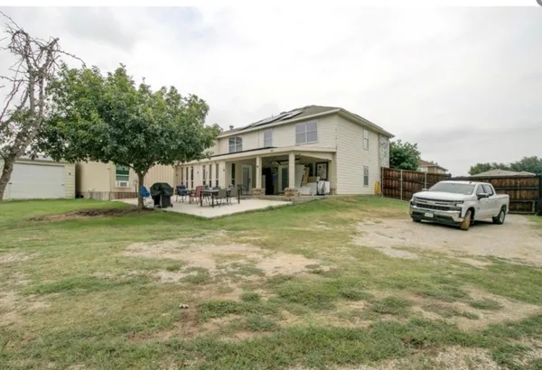 a house view with a garden space