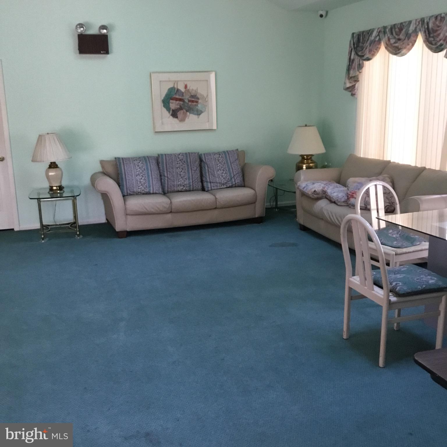 2015 Welsh Road, Unit C38 Philadelphia, PA 19115 - Photo 21 of 24 Recreation center living room/full kitchen/shower