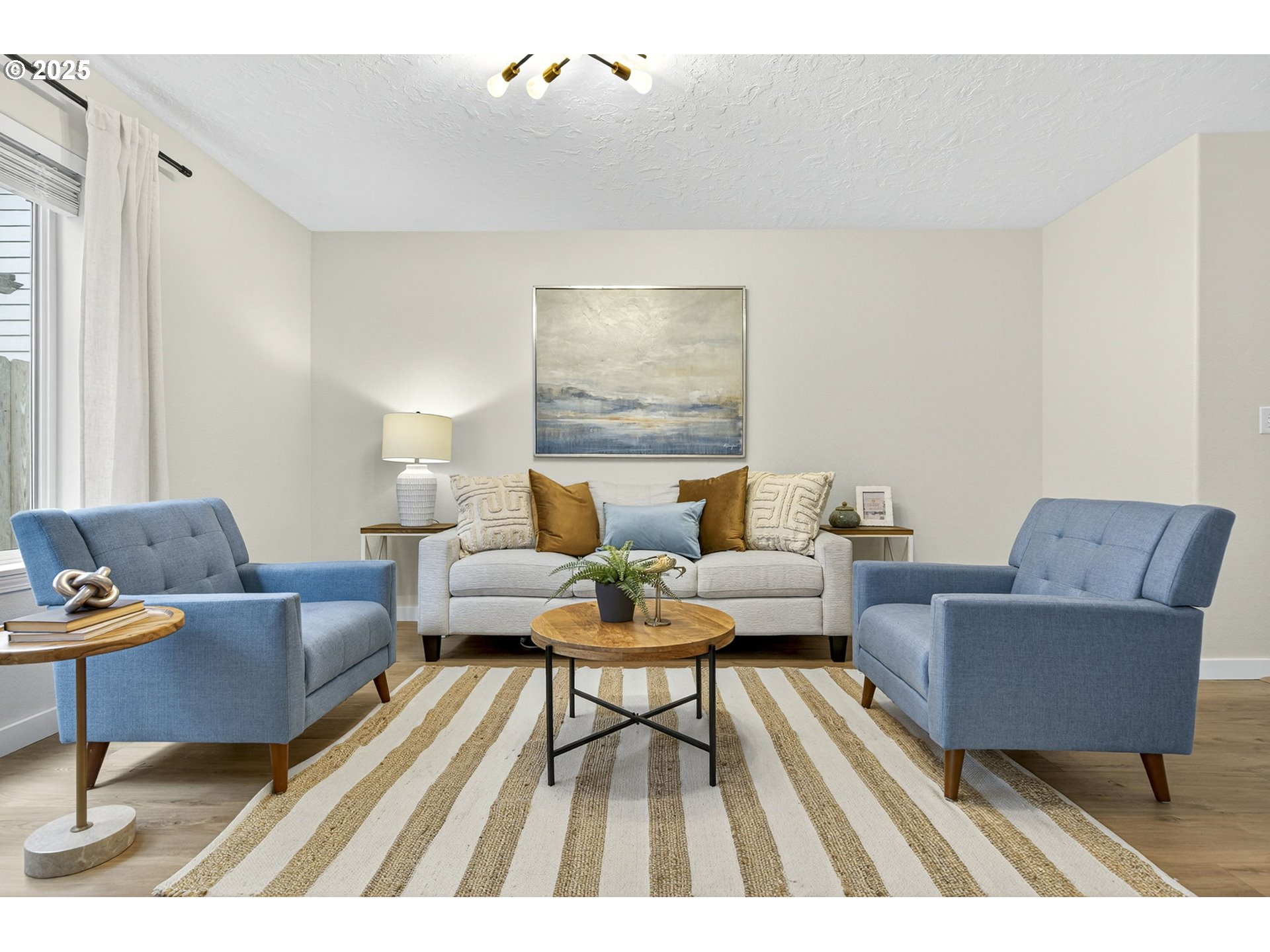 929 Northwest Spring Street Newport, OR 97365 - Photo 14 of 46 a living room with furniture and a rug