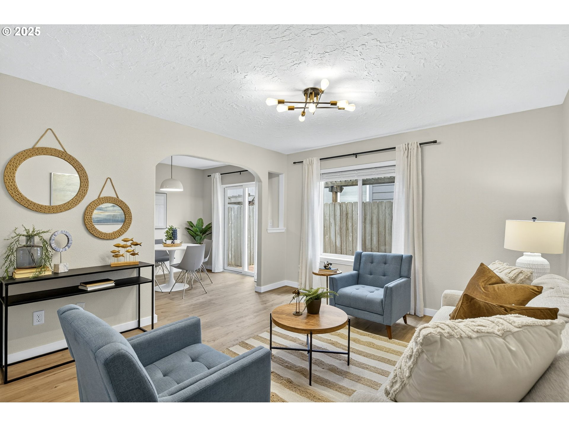929 Northwest Spring Street Newport, OR 97365 - Photo 16 of 46 a living room with furniture and a large window