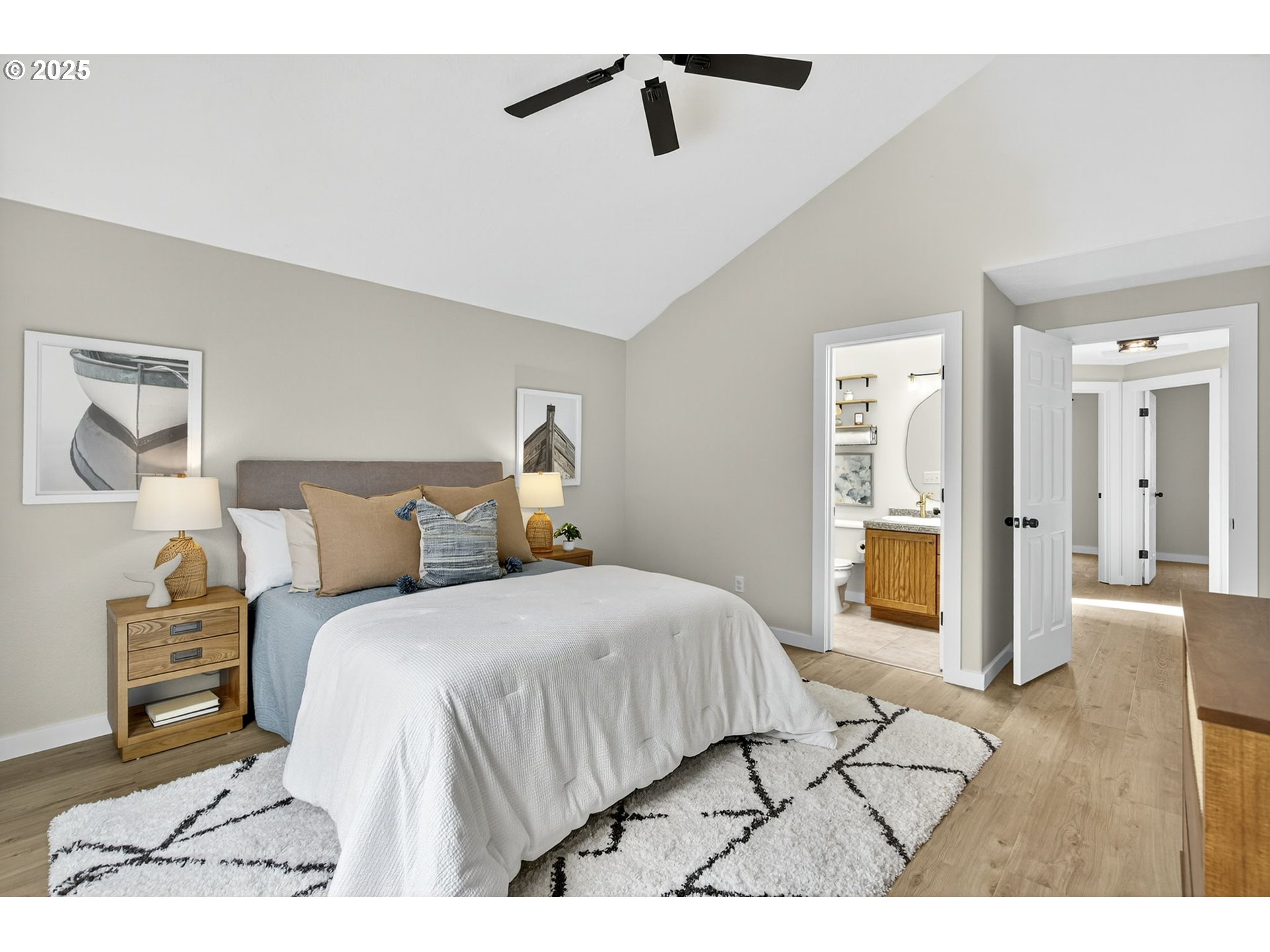 929 Northwest Spring Street Newport, OR 97365 - Photo 33 of 46 a bedroom with a bed and a view of bathroom