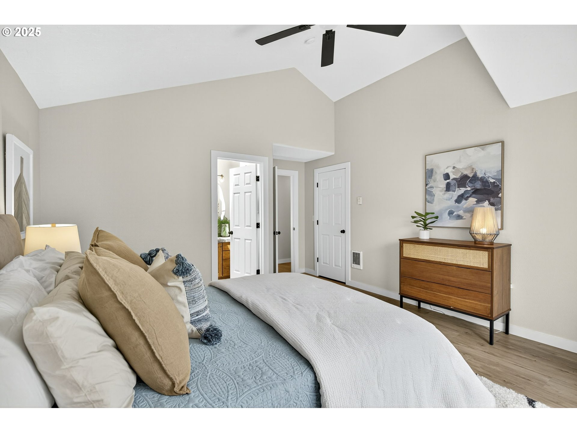 929 Northwest Spring Street Newport, OR 97365 - Photo 34 of 46 a bedroom with a bed and a cabinet