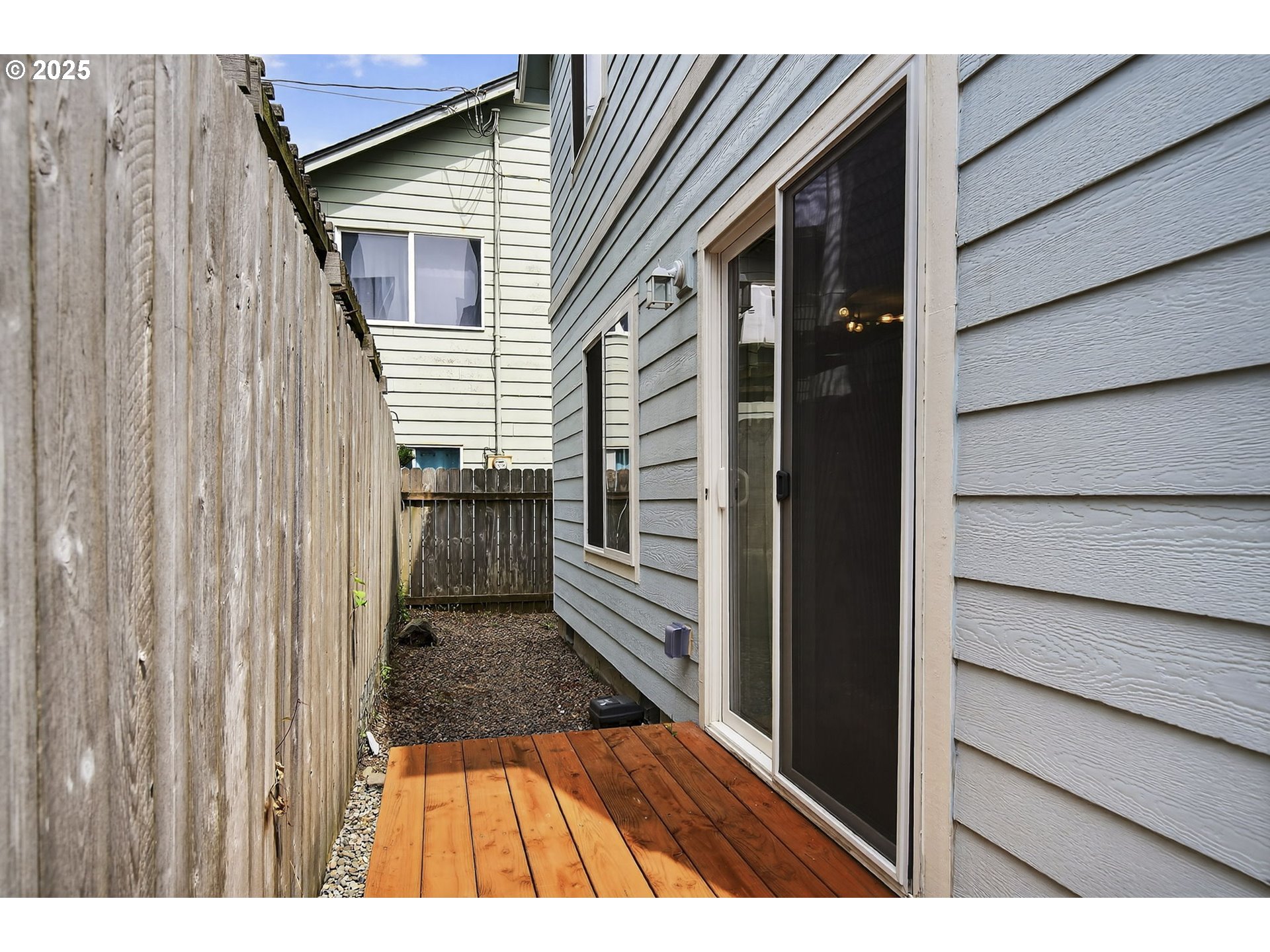 929 Northwest Spring Street Newport, OR 97365 - Photo 37 of 46 a view of a house with a door