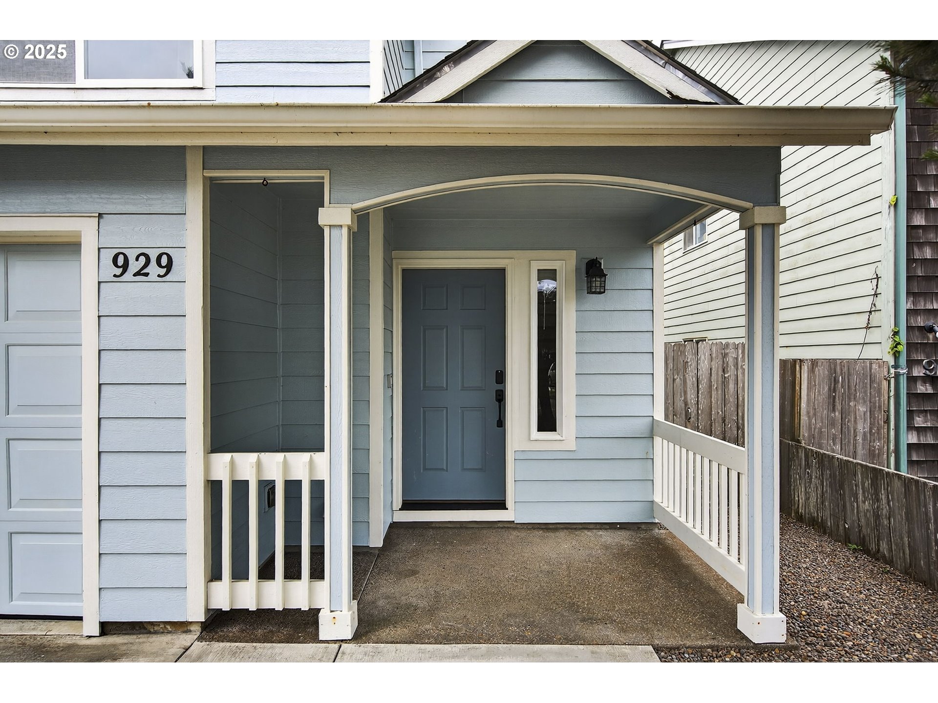 929 Northwest Spring Street Newport, OR 97365 - Photo 4 of 46 a view of a house with a small porch