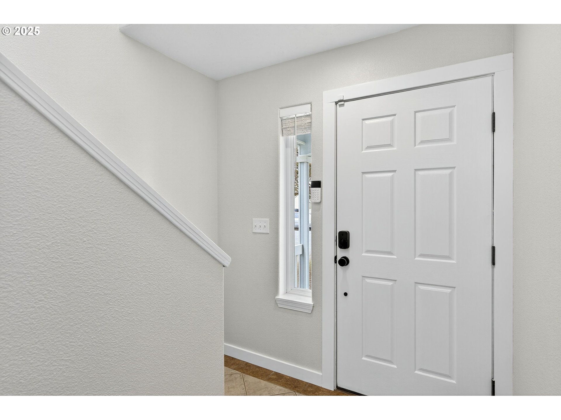 929 Northwest Spring Street Newport, OR 97365 - Photo 5 of 46 a view of a hallway with white walls