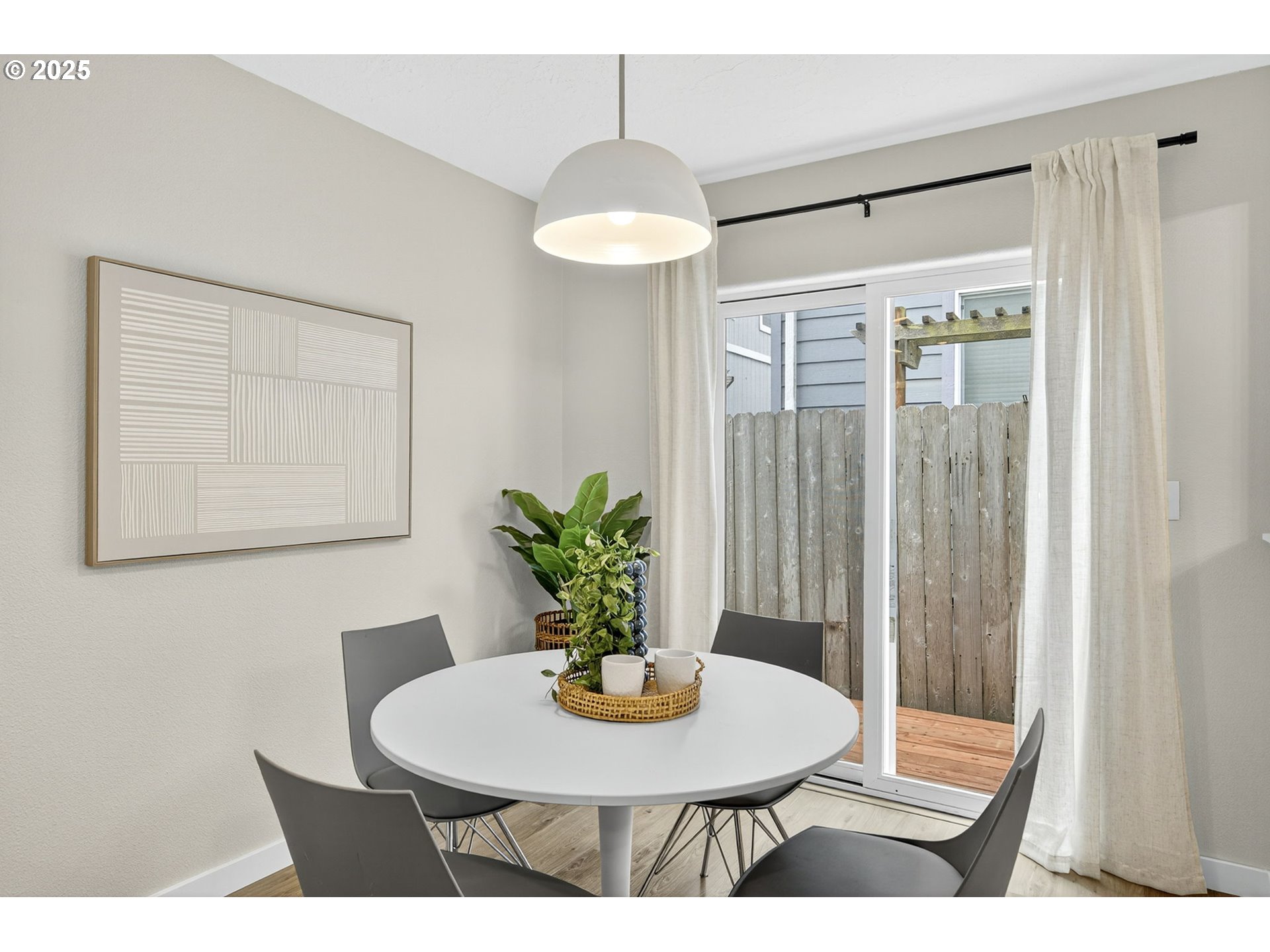 929 Northwest Spring Street Newport, OR 97365 - Photo 10 of 46 a view of a dining room with furniture and wooden floor