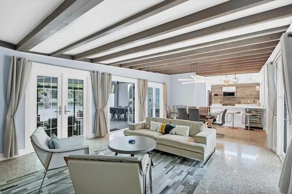 a kitchen with stainless steel appliances granite countertop a stove and a sink