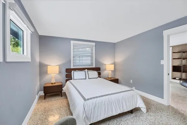 a workspace with furniture and a flat screen tv