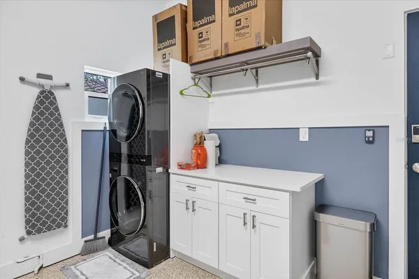 an aerial view of a city with ocean view