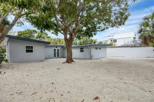 a view of a field with an outdoor space
