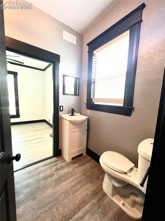 Undisclosed Address Pueblo, CO 81004 - Photo 6 of 7 a bathroom with a toilet sink and a bathtub