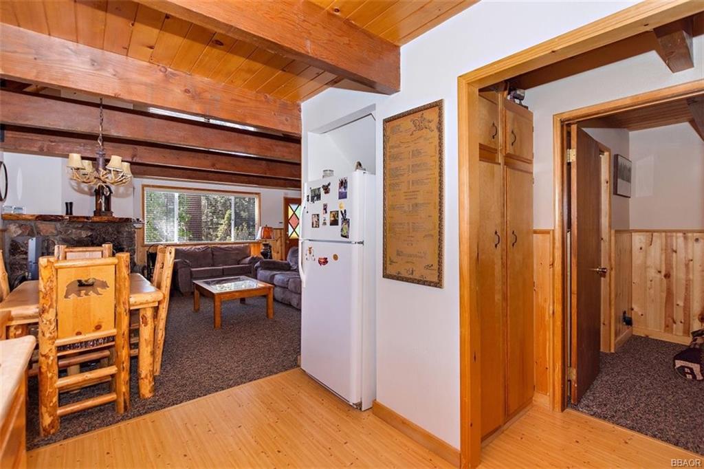 1082 Snow Ridge Road Big Bear City, CA 92314 - Photo 14 of 27 a view of living room filled with furniture and a window
