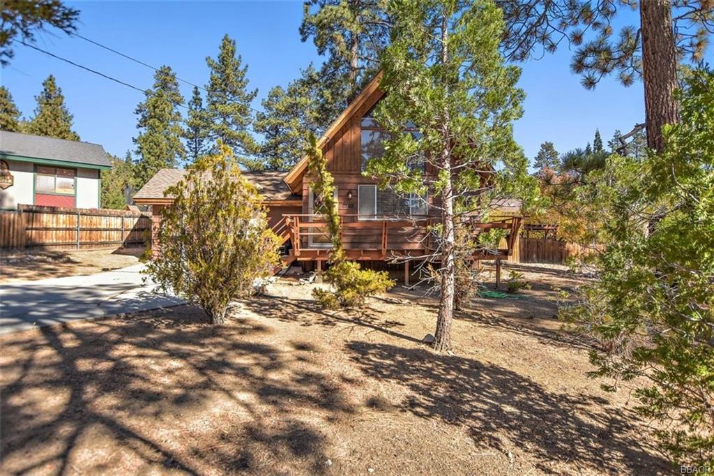 1082 Snow Ridge Road Big Bear City, CA 92314 - Photo 22 of 27 a view of a house with a tree