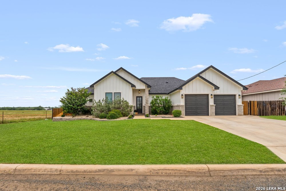 116 Park Heights Poth, TX 78147 - Photo 2 of 48 a front view of a house with yard